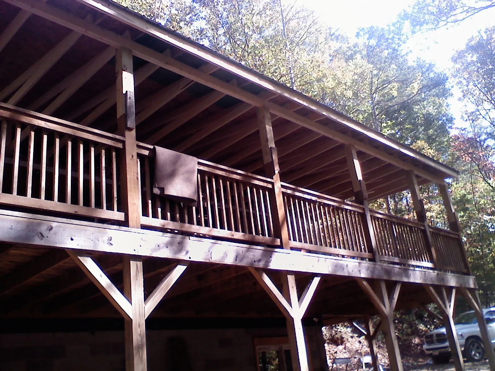 Timber framing under a new elevated porch and deck — Roof Leak Repair in Seven Springs by Roofing Brothers